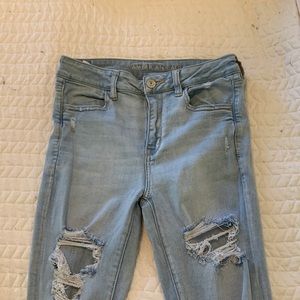 Light wash, Raw hem, “Next Level Stretch”, American Eagle Skinny Jeans